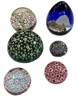 Lot 501 - A group of six paperweights including...