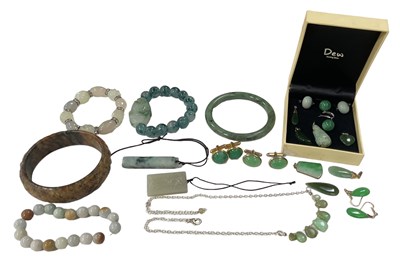 Lot 834 - A group of jade and jadeite jewellery...