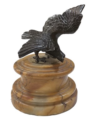 Lot 524 - A bronze model of an eagle, on siena marble...