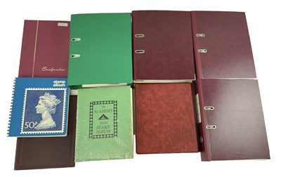 Lot 343 - A group of eight albums of all world stamps.