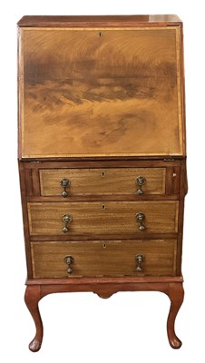 Lot 64 - A small Edwardian crossbanded three drawer...