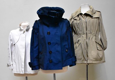 Lot 897 - BURBERRY; a navy blue short trench coat with...