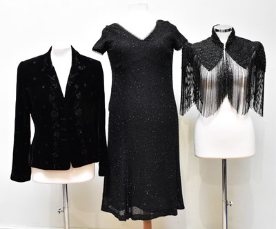 Lot 911 - CAROLINE CHARLES; a knee length fully beaded...