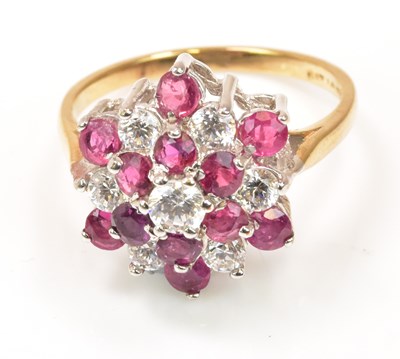 Lot 1176 - A 9ct yellow gold moissanite flower head ring...