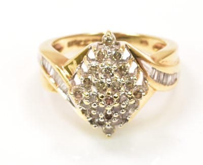 Lot 1182 - A 9ct yellow gold dress ring with lozenge...