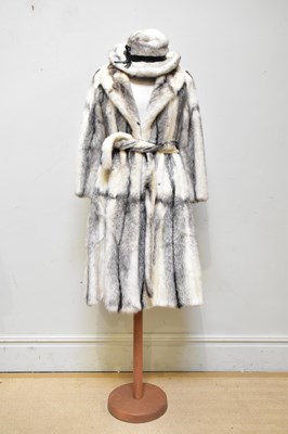 Lot 893 - A full length cream and black lined mink coat...
