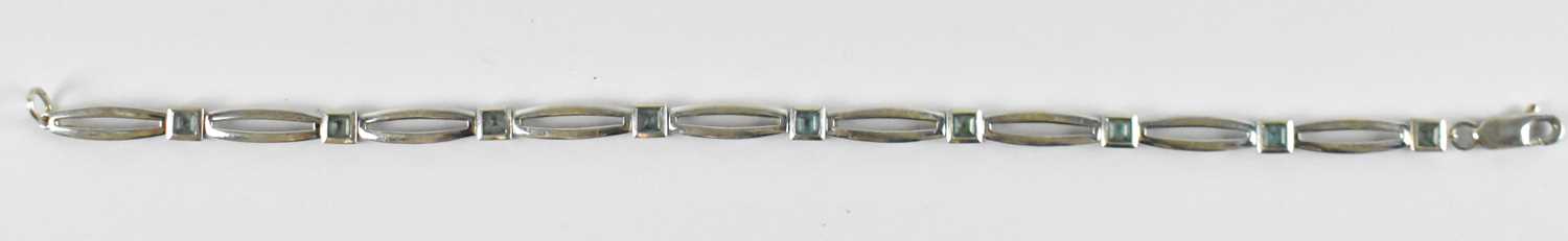 Lot 773 - A 9ct white gold aquamarine bracelet, set with...