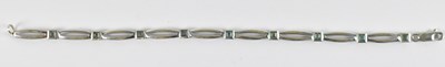 Lot 773 - A 9ct white gold aquamarine bracelet, set with...