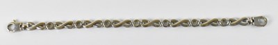 Lot 798 - A 9ct white gold bracelet, length 18.5cm,...