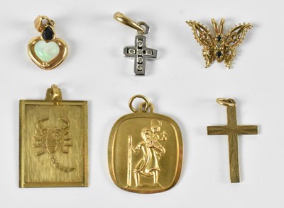 Lot 827 - Two 9ct yellow gold pendants, one decorated...