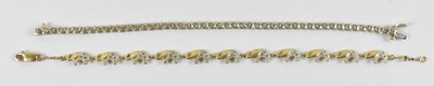 Lot 769 - A 9ct white gold tennis bracelet, length 19cm,...