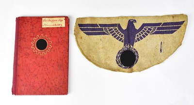 Lot 420 - A WWII era German work book and a Kriegsmarine...