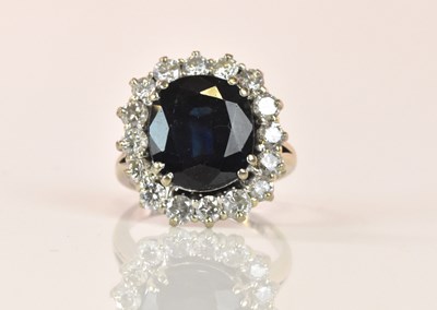 Lot 1269 - An 18ct white gold sapphire and diamond large...