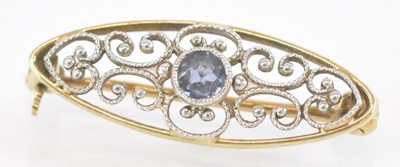 Lot 879 - A 14ct yellow gold aquamarine set brooch,...