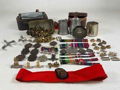 Lot 72 - A group of militaria including medals awarded...