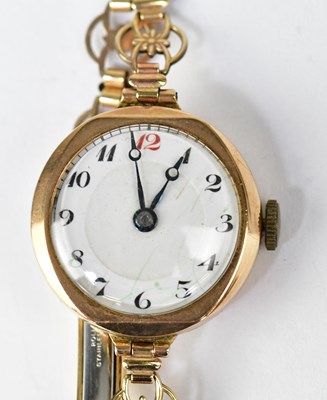Lot 1346 - A ladies' vintage wristwatch in a 9ct gold...
