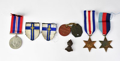 Lot 428 - A group of three WWII medals comprising War...