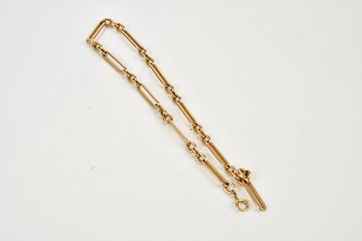 Lot 660 - A 15ct yellow gold trombone link Albert chain,...