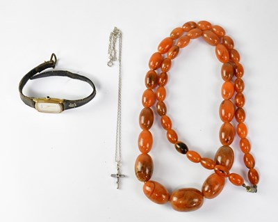 Lot 646 - A vintage amber-style necklace of graduated...