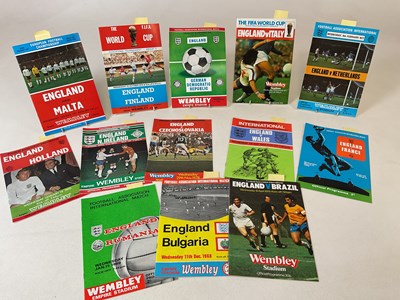 Lot 124 - ENGLAND FOOTBALL; thirteen football programmes...