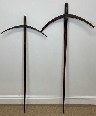 Lot 28 - Two unusual wooden bows, possibly Malaysian,...