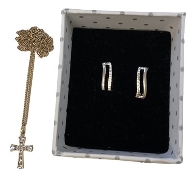 Lot 808 - A 9ct yellow gold white stone set crucifix...