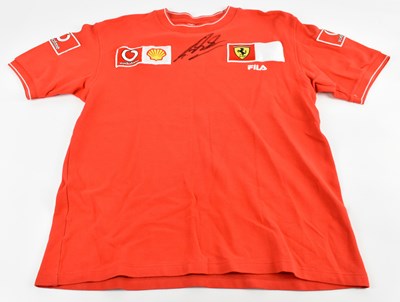 Lot 302 - MICHAEL SCHUMACHER; a Ferrari shirt, signed to...