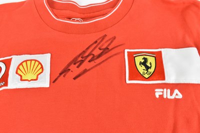 Lot 302 - MICHAEL SCHUMACHER; a Ferrari shirt, signed to...