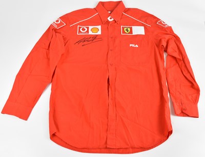 Lot 304 - MICHAEL SCHUMACHER; a Ferrari long sleeved...