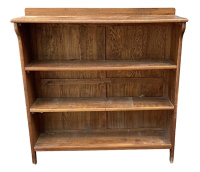 Lot 27 - An early 20th century oak bookcase with three...