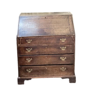 Lot 53 - A 19th century oak bureau, with fall front...