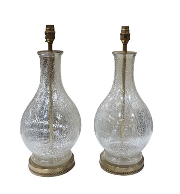 Lot 104 - A pair of modern crackled glass effect brass...