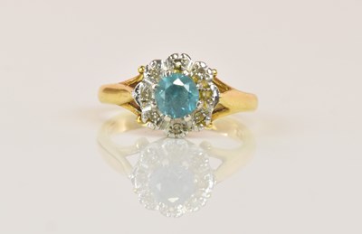 Lot 1302 - An 18ct yellow gold flower head dress ring,...