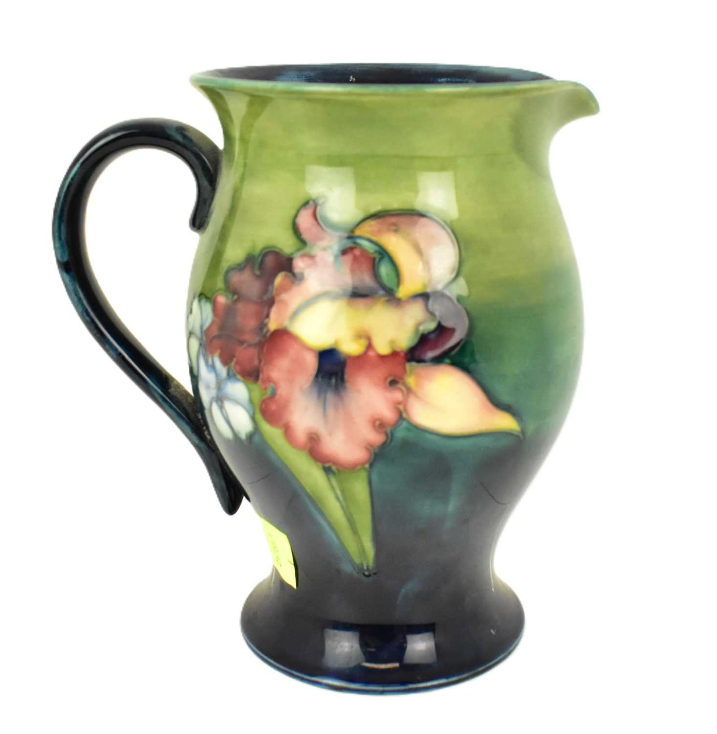 Lot 517 - WALTER MOORCROFT; a large pottery jug...