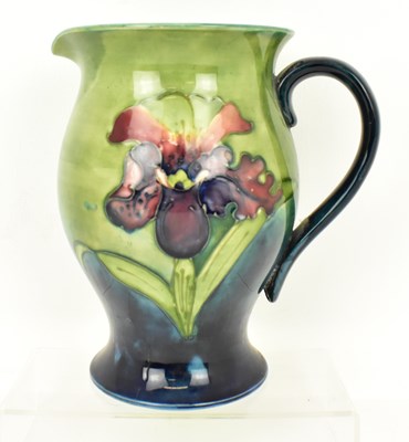 Lot 517 - WALTER MOORCROFT; a large pottery jug...