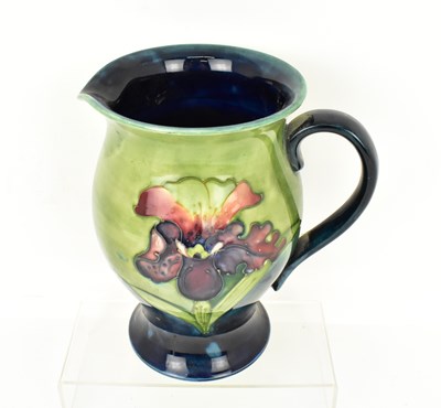 Lot 517 - WALTER MOORCROFT; a large pottery jug...