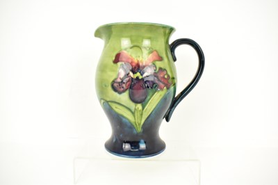 Lot 517 - WALTER MOORCROFT; a large pottery jug...