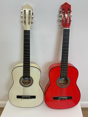 Lot 125 - PEARL RIVER; two guitars, one red and the...