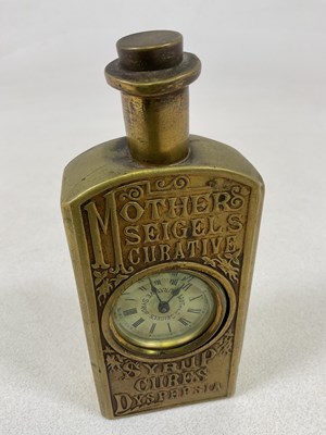 Lot 55 - A novelty advertising timepiece in the form of...