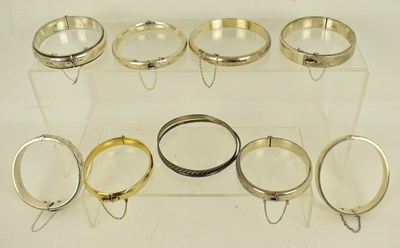 Lot 624 - Nine hallmarked silver hinged bracelets with...