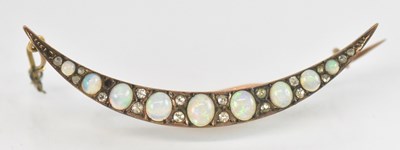 Lot 718 - An Edwardian yellow metal opal and diamond set...