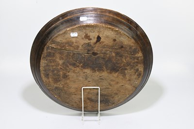 Lot 32 - A 19th century fruitwood dough bowl of...