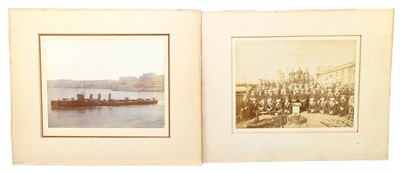 Lot 437 - A pair of Naval photographs, one the crew of...