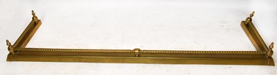 Lot 173 - A large reproduction brass fender with four...