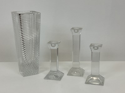 Lot 246 - A contemporary cut glass vase and three mould...