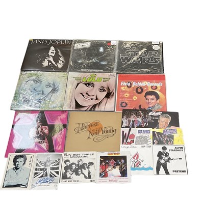 Lot 519 - A quantity of records and 45s including Abba...