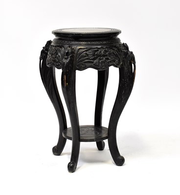 Lot 76 - A Chinese ebonised jardinière stand, with...