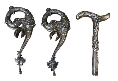 Lot 676 - A miniature white metal walking stick or...