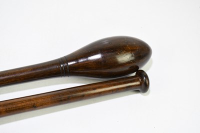 Lot 30 - A pair of turned and stained treen exercise...