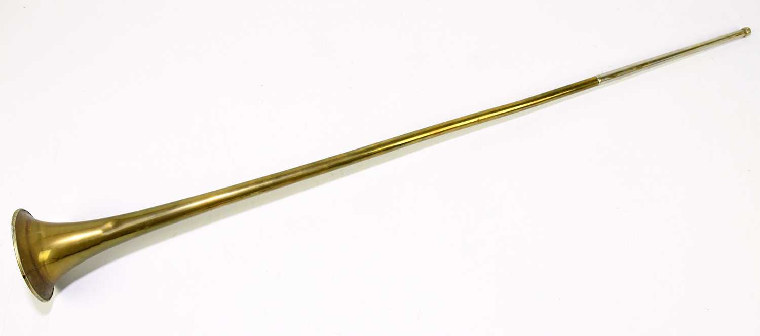 Lot 344 - A brass hunting horn with nickel mouthpiece...